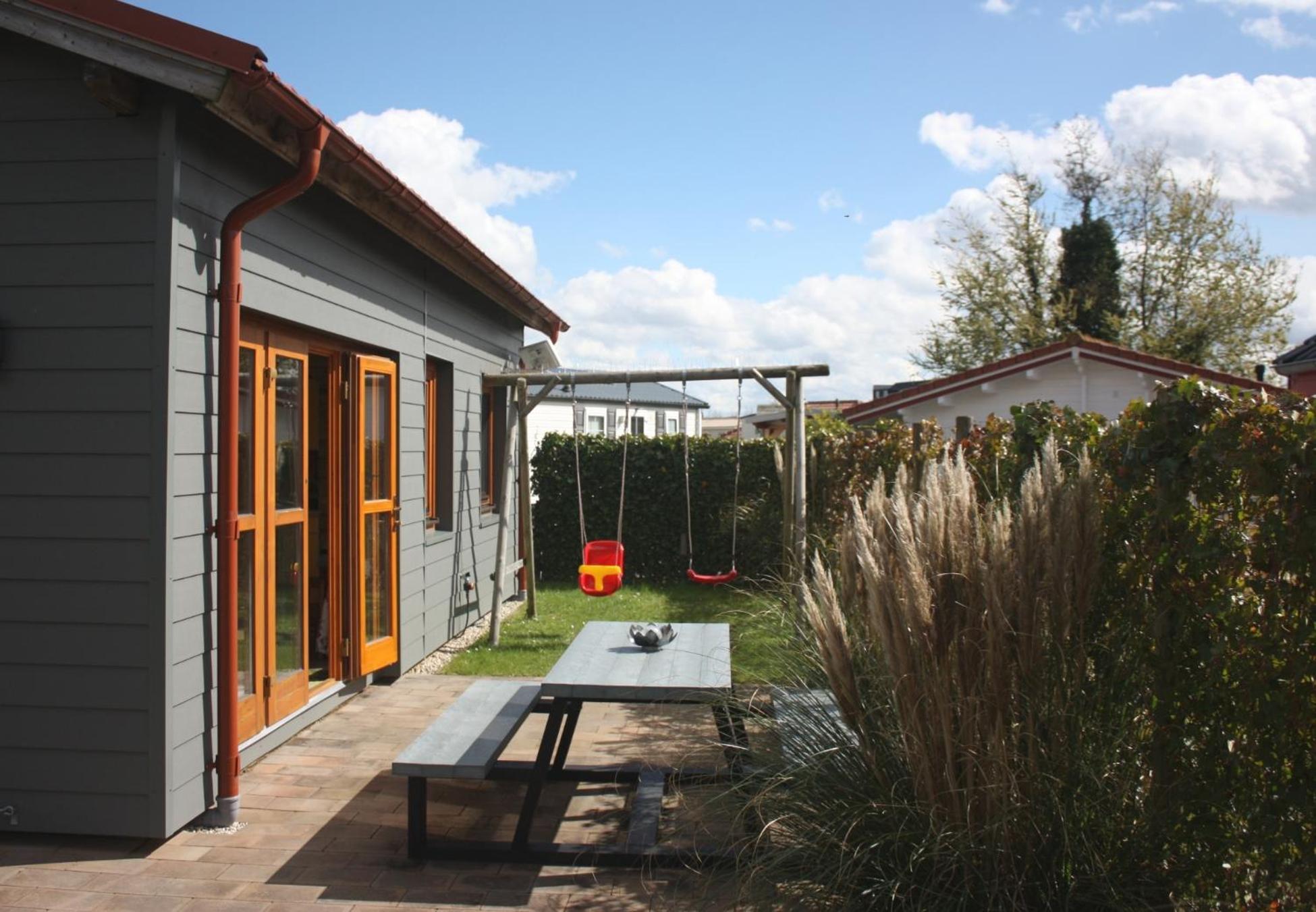 Villa Emilia - Gemuetliches Kinderfreundliches Blockhaus Mit Umzaeuntem Garten Sint Annaland Esterno foto